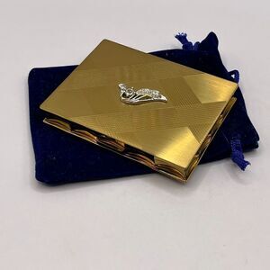 Volupte, Vintage, gold tone with Rhinestone leaf detail, compact.